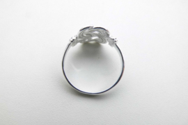 Zilveren mattenklopper ring.