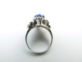 Zilveren blauwe steen markies ring.