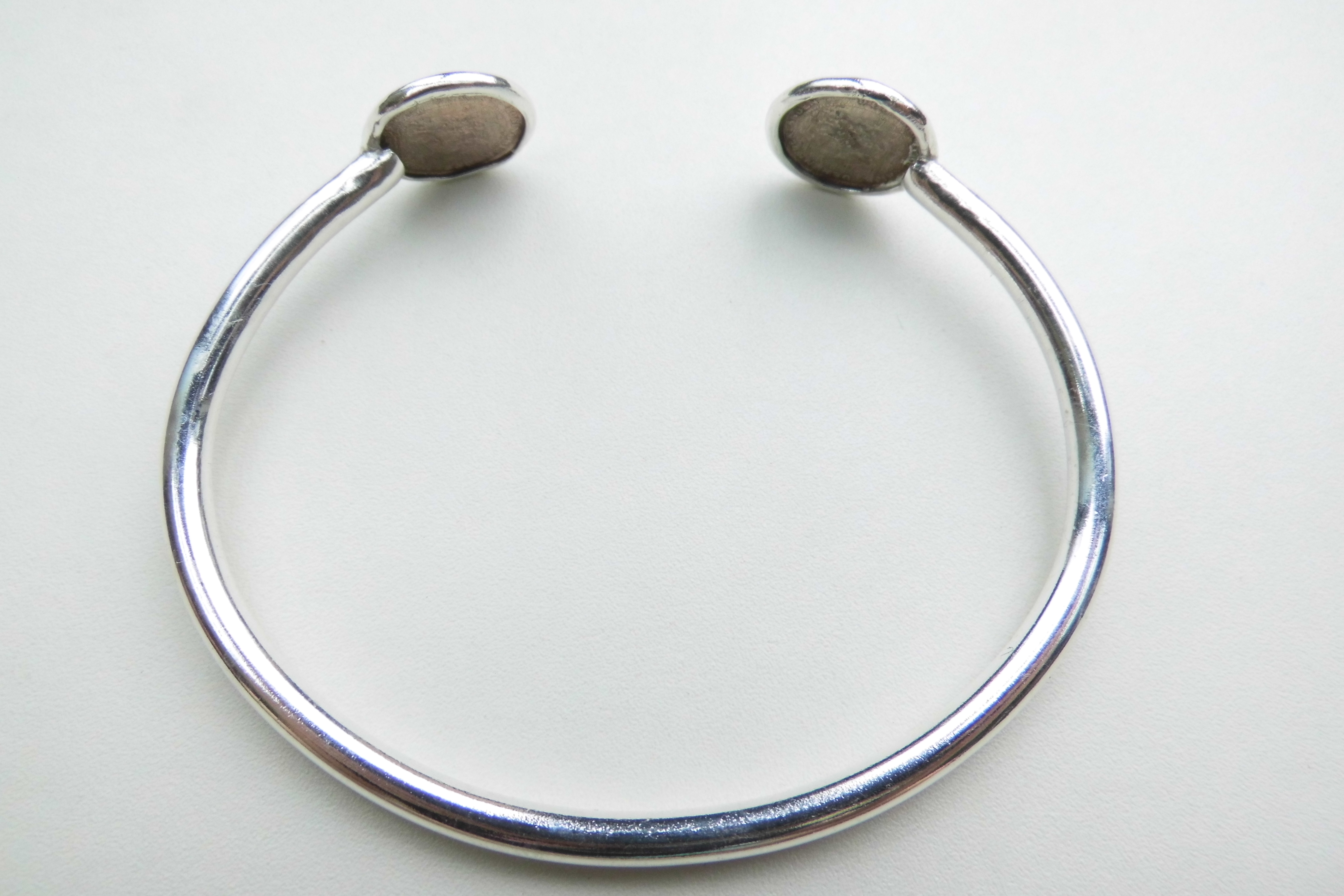 Zilveren halve cent boei armband.