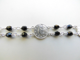 Zilveren Liberty muntjes zwarte kralen bracelet.