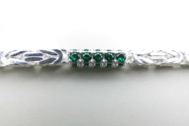 Zilveren konings bracelet met groene zirkonia steentjes buis.