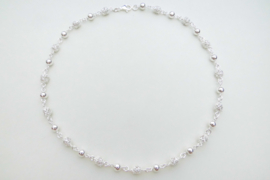 Zilveren makka-peri ballen ketting.