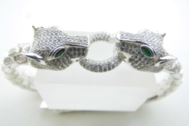 Zilveren panter koppen bracelet met zirkonia steentjes en groene ogen.