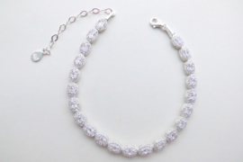 Zilveren ovaal clustered tennis bracelet.