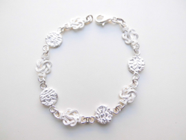 Zilveren piet piet  mattenklopper bracelet. (medium)
