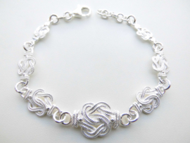 Zilveren mattenklopper bracelet (groot naar klein)