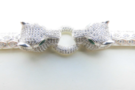 Zilveren panter koppen bracelet met zirkonia steentjes en groene ogen.