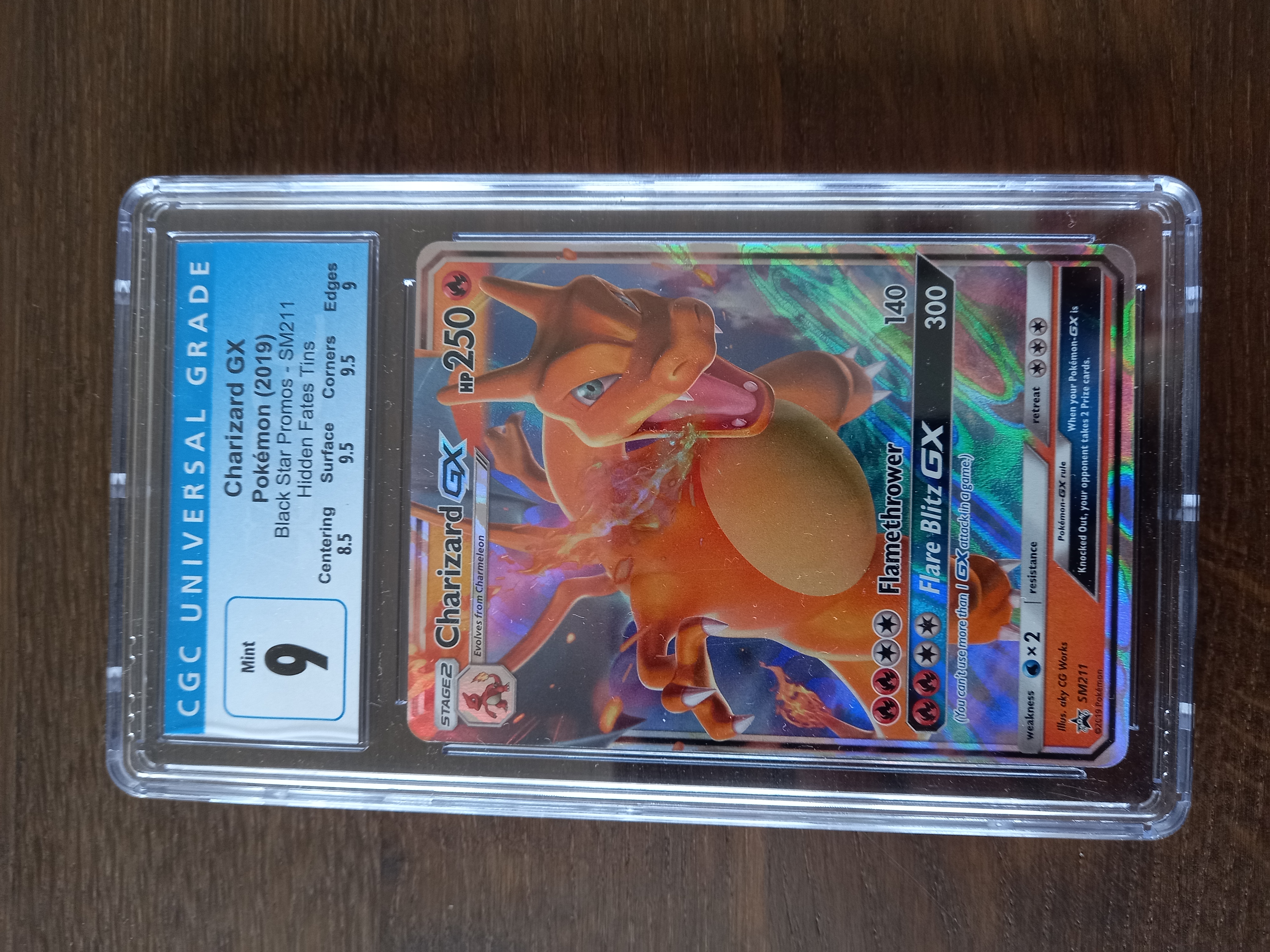 Charizard gx black star promo sm211 cgc9
