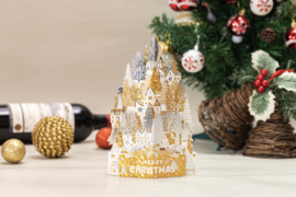 3D Pop up kerstkaart goud witte huizen op een sneeuwheuvel