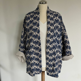 Doorgestikt jasje blauw