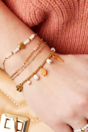 Armband parels en hartjes goud