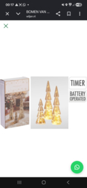 Prachtige glazen kerstbomen met licht