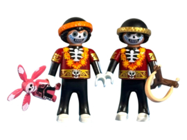 Día de Muertos : broertjes met speelgoed