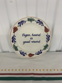 Wandbord eigen haard is goud waard Boch