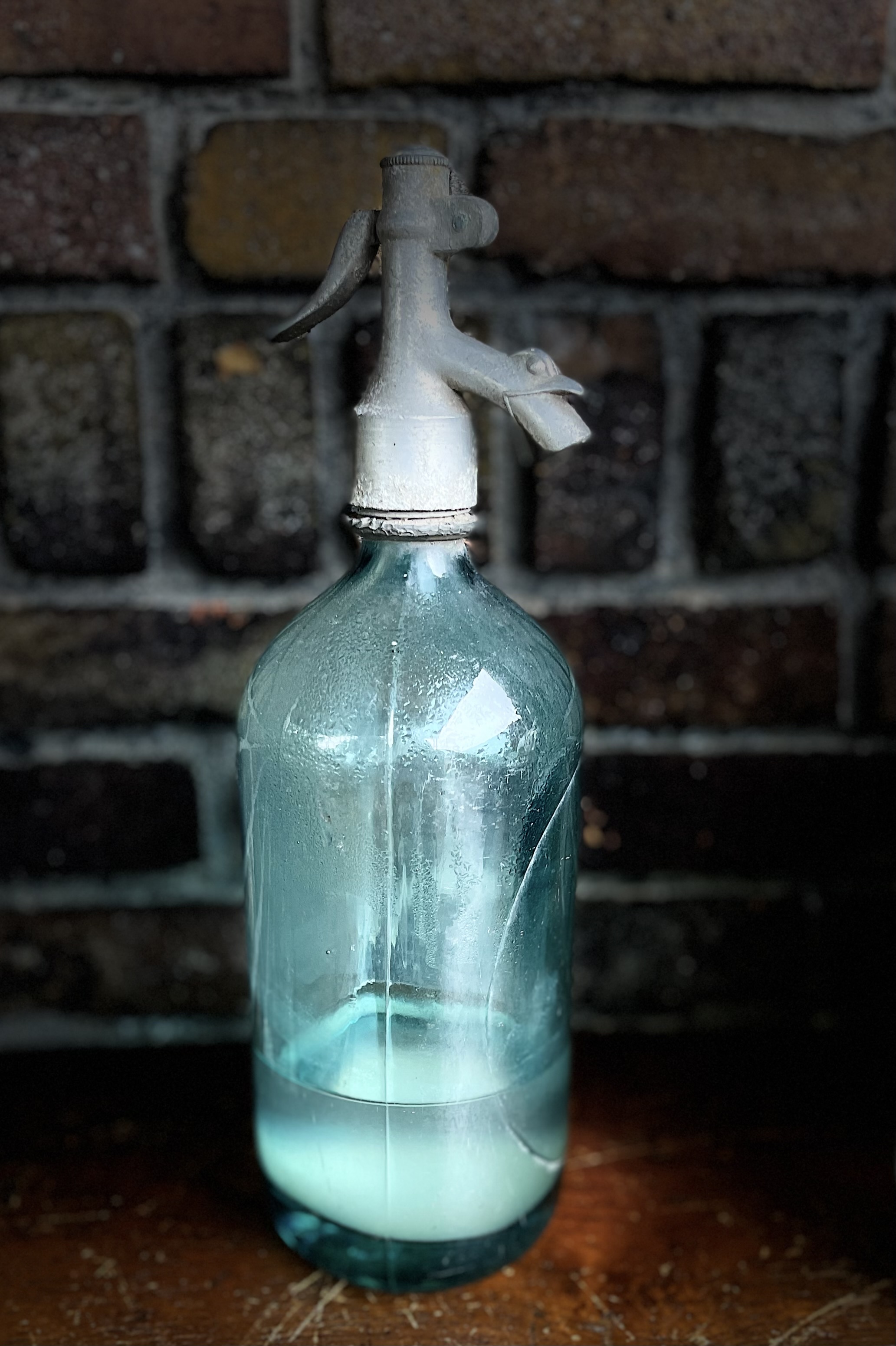 oude glazen spuitfles