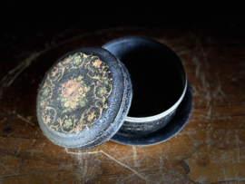 rond blik bloem met onderzetter