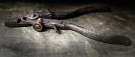 Tang met gedetailleerd handvat