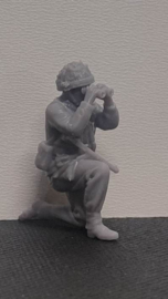 F-alk26 looking with the binoculars.