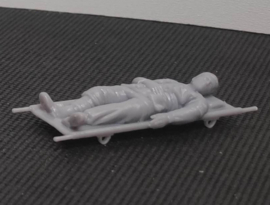 F-alk49 wounded on Stretcher.