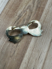 broche strikje
