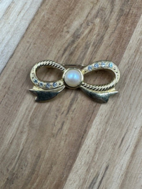 broche strikje