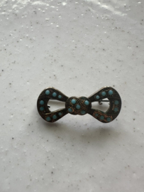 broche mini strikje