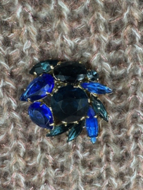 broche blauw glas