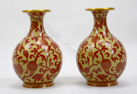 A mirrored pair of Chinese hand made cloisonne vases, mid 20th century