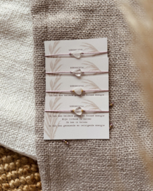 Bergkristal op satijnkoord - Mauve