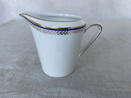 Melkkannetje en suikerpot Jäger & Co, sierrand met blauw en goud