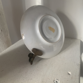 Kandelaar gemaakt van een oud schoteltje
