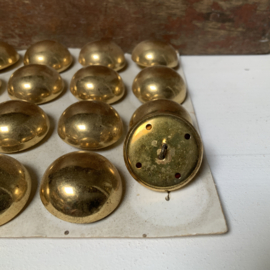 Kaart met “ gouden” knopen