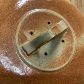 Een keramieken cloche