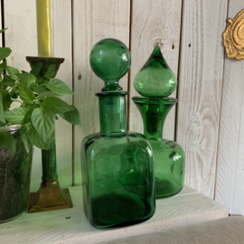 Vintage fles met stop van groen glas