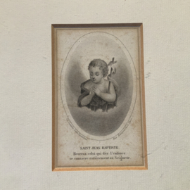 Een ingelijst bidprentje