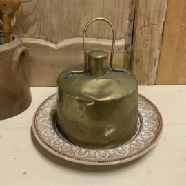 Een koperen cloche