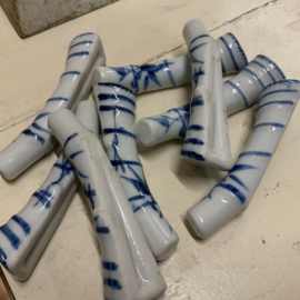 Set van 8 porseleinen messenleggers