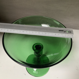 Groene schaal op voet
