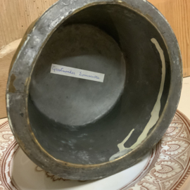 Een koperen cloche