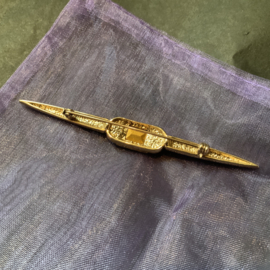 Lange broche
