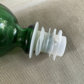 Vintage fles met stop van groen glas