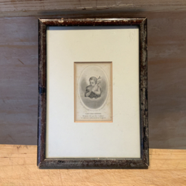 Een ingelijst bidprentje