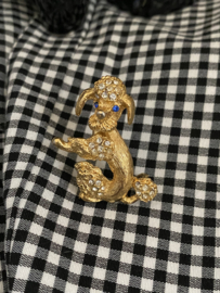 Poedel broche