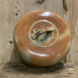 Een keramieken cloche