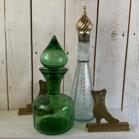 Vintage stopfles met goudkleurige stop