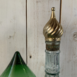 Vintage stopfles met goudkleurige stop