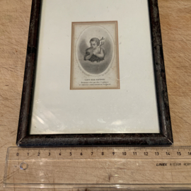 Een ingelijst bidprentje