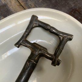 Faux bamboo opener