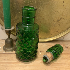 Vintage fles met stop van groen glas