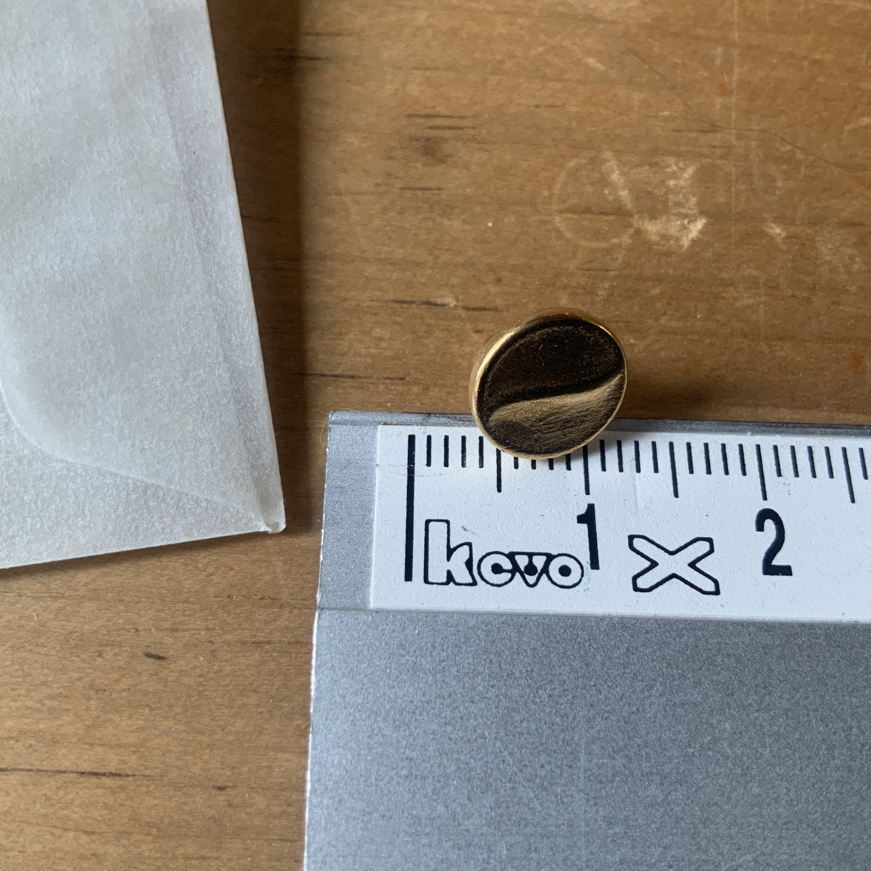 Set kleine goudkleurige knoopjes